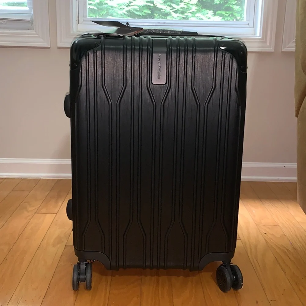 Traveler’s Choice Black Hard-case 24” Suitcase